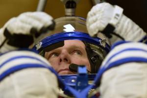 ISS crew Virts gestures during a space suit test at&nbsp;&hellip;