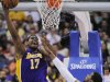 Los Angeles Lakers center Andrew Bynum (17) shoots as Los Angeles Clippers center DeAndre Jordan defends during the first half of their NBA basketball game, Wednesday, April 4, 2012, in Los Angeles. (AP Photo/Mark J. Terrill)