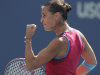 Flavia Pennetta of Italy reacts during her match with Maria Sharapova of Russia during the U.S. Open tennis tournament in New York, Friday, Sept. 2, 2011. (AP Photo/Charlie Riedel)