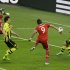 Bayern's Mario Mandzukic of Croatia, center, scores the opening goal during the Champions League Final soccer match between  Borussia Dortmund and Bayern Munich at Wembley Stadium in London, Saturday May 25, 2013. (AP Photo/Alastair Grant)