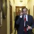 Conservative New Democracy leader and winner in Greece's general elections Samaras makes a phone call before a meeting in Athens
