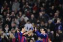 FC Barcelona's Lionel Messi, from Argentina, right, reacts after scoring with his teammate Luis Suarez, from Uruguay, against Villarreal during a Semifinal, first leg, Copa del Rey soccer match at the Camp Nou stadium in Barcelona, Spain, Wednesday, Feb. 11, 2015. (AP Photo/Manu Fernandez)