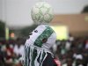 A performer juggles a ball before the start of match between Nigeria and Burkina Faso in Lagos