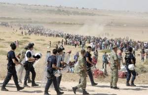 Turkish policemen and soldiers walk as Syrian Kurds&nbsp;&hellip;