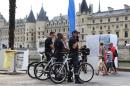 Members of the Paris VTT brigade of the DPP patrol along the banks of the Seine during the opening day of the Paris Plages beach festival in Paris
