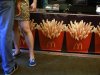 A couple stands in line at McDonald's in New York's Times Square