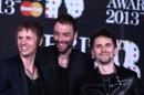 Matthew Bellamy, Christopher Wolstenholme and Dominic Howard of British rock band Muse