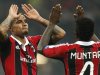 AC Milan's Muntari and Boateng react at the end of his Champions League soccer match against Barcelona at the San Siro stadium in Milan