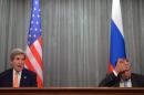 Russian Foreign Minister Sergei Lavrov (R) gestures as US Secretary of State John Kerry speaks during a press conference in Moscow on July 15, 2016