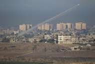 A rocket launched by Palestinian militants towards Israel makes its way from the northern Gaza Strip, seen from the Israel Gaza Border, southern Israel, Thursday, Nov. 15, 2012. (AP Photo/Ariel Schalit)