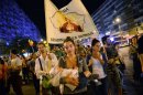 Protesters march during the eighth day of demonstrations in Bucharest on September 8, 2013