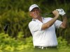 Montgomerie of Scotland tees off during the first round of the Barclays Singapore Open golf tournament in Sentosa