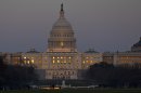 The setting sun is reflected in the windows of the U.S. Capitol, on Capitol Hill, Friday, March 22, 2013 in Washington. (AP Photo/Alex Brandon)