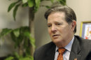 In this Wednesday, Sept. 19, 2012 photo, former House Majority Leader Tom DeLay speaks about his upcoming appeal on a money laundering conviction at his attorney's office in Houston. (AP Photo/Pat Sullivan)