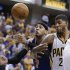 New York Knicks' Carmelo Anthony, left, and Indiana Pacers' Paul George vie for a rebound during the first half of Game 4 of an Eastern Conference semifinal NBA basketball playoff series, on Tuesday, May 14, 2013, in Indianapolis. (AP Photo/Darron Cummings)