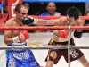 Shinsuke Yamanaka (right) punches Cristian Esquivel of Mexico during their WBC bantamweight title fight in Tokyo in 2011