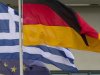 European, Greek and German flags fly outside the Chancellery in Berlin