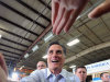 Republican presidential candidate, Mitt Romney, shakes hands with supporters after finishing his speech during a rally at Guerdon Enterprises in Boise, Idaho  Friday, Feb. 17, 2012. (AP Photo/Idaho Press-Tribune, Adam Eschbach) MANDATORY CREDIT