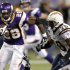 FILE - In this Nov. 4, 2007 file photo, Minnesota Vikings running back Adrian Peterson, left, runs past San Diego Chargers safety Marlon McCree, right, during the third quarter of an NFL football game in Minneapolis. Peterson rushed for an NFL record 296 yards in this 2007 game, and the biggest thing he remembers from that performance is he could've easily had more. The rematch comes on Sunday.  (AP Photo/Tom Olmscheid, File)