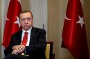 Turkish President Tayyip Erdogan prepares for an interview in New York