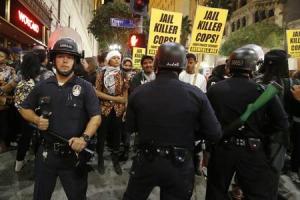 Protesters face off against police before being detained &hellip;