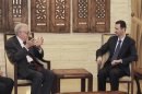 Syria's President Bashar al-Assad meets with U.N.-Arab League peace envoy for Syria Lakhdar Brahimi in Damascus