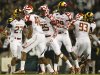 In this photo taken Sept. 5, 2011, members of the Maryland football team transition during a change of possession in the first half of an NCAA football game against Miami in College Park, Md. (AP Photo/Patrick Semansky)