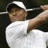 Tiger Woods hits from the eighth tee during the third round of The Players championship golf tournament at TPC Sawgrass, Saturday, May 11, 2013 in Ponte Vedra Beach, Fla. (AP Photo/Gerald Herbert)