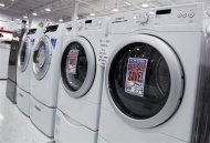 Washers and dryers are seen on display at a store in New York July 28, 2010. REUTERS/Shannon Stapleton
