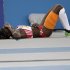 Cuba's Yargeris Savigne lies on the track in the final of the Women's Triple Jump at the World Athletics Championships in Daegu, South Korea, Thursday, Sept. 1, 2011. (AP Photo/David J. Phillip)