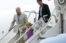 Vice President Joe Biden arrives at Harrisburg International Airport with his grandson Hunter Biden and son Beau Biden, right, Sunday, Sept. 2, 2012, in Middletown, Pa. (AP Photo/Carolyn Kaster)