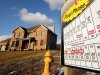 This Jan. 18, 2012 photo shows a new home in a development in Pleasant Hills, Pa. Fewer people bought new homes in December, making 2011 the worst sales year on record. (AP Photo/Gene J. Puskar)