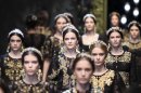 Models wear creations part of the Dolce & Gabbana women's Fall-Winter 2012-13 fashion collection, during the fashion week in Milan, Italy, Sunday, Feb. 26, 2012. (AP Photo/Antonio Calanni)