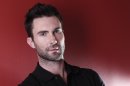In this Feb. 20, 2012 photo, musician Adam Levine poses for a portrait in New York. Levine, the frontman for the band Maroon 5, also serves as a coach on the TV singing competition series, 