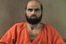 FILE - This undated file photo provided by the Bell County Sheriff's Department shows Nidal Hasan, who is charged in the 2009 shooting rampage at Fort Hood that left 13 dead and more than 30 others wounded. Hasan doesn't deny that he carried out the rampage, but military law prohibits him from entering a guilty plea because authorities are seeking the death penalty. If he is convicted and sentenced to death in a trial that starts Tuesday, Aug. 6, 2013, there are likely years, if not decades, of appeals ahead. (AP Photo/Bell County Sheriff's Department, File)