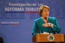 Chile's President Bachelet delivers a speech regarding a tax reform law, during a ceremony in Santiago