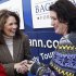 Republican presidential candidate, Rep. Michele Bachmann, R-Minn., left, greets supporters during a campaign stop at the Black Bear Diner, Friday, Dec. 30, 2011, in Storm Lake, Iowa. (AP Photo/Eric Gay)