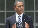 Obama signs legislation to avert default