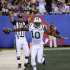 New York Jets' Santonio Holmes celebrates his touchdown during the second quarter of an NFL preseason football game against the New York Giants, Monday, Aug. 29, 2011, in East Rutherford, N.J. (AP Photo/Bill Kostroun)