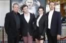 Sanders poses with cast members Kristen Stewart and Sam Claflin , and producer Joe Roth at an industry screening of "Snow White and the Huntsman" at the Mann Village theatre in Westwood