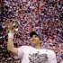New York Giants quarterback Eli Manning holds up the Vince Lombardi Trophy while celebrating his team's 21-17 win over the New England Patriots in the NFL Super Bowl XLVI football game, Sunday, Feb. 5, 2012, in Indianapolis.  (AP Photo/David J. Phillip)