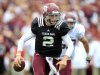 Texas A&M quarterback Johnny Manziel (2) scrambles with the ball during the first half of the Aggies' Maroon & White spring NCAA college football game at Kyle Field, Saturday, April 13, 2013, in College Station, Texas.  (AP Photo/Houston Chronicle, Karen Warren) MANDATORY CREDIT