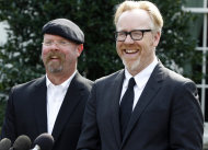 Discovery Channel's MythBusters hosts, Jamie Hyneman, left, and Adam Savage, speak to reporters outside the White House in Washington, Monday, Oct. 18, 2010, after they taped a segment with President Barack Obama.