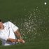 Ryan Palmer of the U.S. hits from a sand trap on the second green during first round play in the 2012 Masters Golf Tournament at the Augusta National Golf Club in Augusta