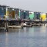 In this photo taken Wednesday, March 28, 2012 amphibious homes are seen on the River Maas in Maasbommel, Netherlands. The Netherlands, a third of which lies below sea level, has been managing water since the Middle Ages and has thus emerged as a pioneer in the field, exporting its expertise to Indonesia, China, Thailand, Dubai and the Republic of the Maldives, an Indian Ocean archipelago that with a maximum elevation of about 2 meters (8 feet) is the world's lowest country. (AP Photo/Bas Czerwinski)