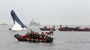 South Korean coast guard officers try to rescue passengers&nbsp;&hellip;