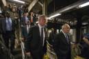 New York Mayor de Blasio and New York City Police Commissioner Bratton enter the City Hall subway station while on their way to give a news conference in New York