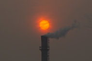 <p>               FILE- Smoke billows from a chimney of a heating plant as the sun sets in Beijing in this file photo dated Monday, Feb. 13, 2012.  U.N. climate talks being held in Bonn, Germany, are in gridlock Thursday May 24, 2012, as a rift between rich and poor countries risked undoing some of the advances made last year in the two-decade-long effort to control carbon emissions from fast-growing economies like China and India as well as developed industrialized nations that scientists say are overheating the planet.(AP Photo/Alexander F. Yuan, File)
