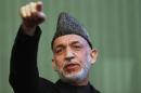 Afghan President Hamid Karzai speaks during news conference in Kabul