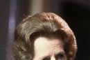 FILE - British Prime Minister Margaret Thatcher listens to the opening debates during the Conservative Party's conference at Blackpool in this file photo dated October 1983. Papers from 1981, released Saturday March 17, 2012, by the Margaret Thatcher archive at Cambridge University in England, reveal a thoughtful softer side to the British leader who earned her nickname 